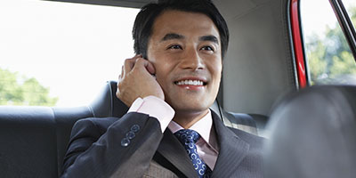 Businessman in Vehicle Businessman in Vehicle